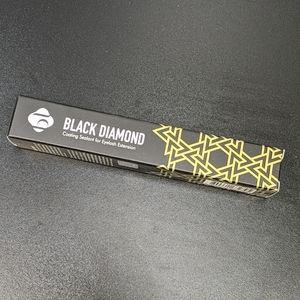 Black diamond coating for eyelash extensions